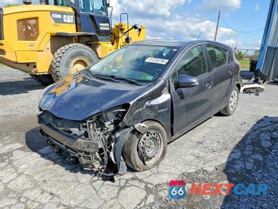 2014 TOYOTA PRIUS C TWO JTDKDTB30E1571186 - główne zdjęcie licytacji z USA - miniatura