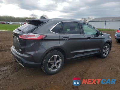 Trzecie zdjęcie samochodu z tyłu: 2020 FORD EDGE SEL VIN:2FMPK4J93LBB23092 - miniatura