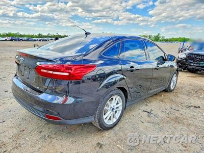 Trzecie zdjęcie samochodu z tyłu: 2015 FORD FOCUS SE VIN:1FADP3F28FL274096 - miniatura