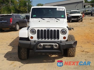 Piąte zdjęcie samochodu w środku: 2013 JEEP WRANGLER UNLIMITED SAHARA VIN:1C4BJWEG5DL629403 - miniatura