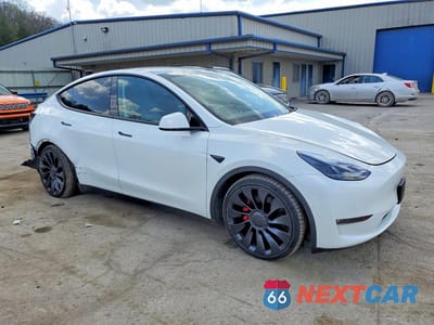 Czwarte zdjęcie samochodu z boku: 2022 TESLA MODEL Y VIN:7SAYGDEF7NF464580 - miniatura