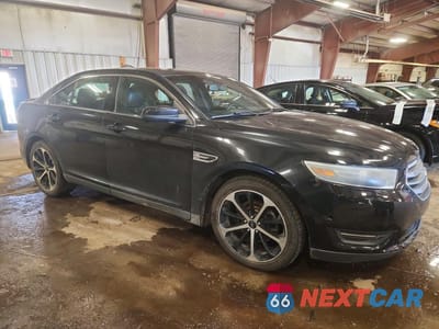 Czwarte zdjęcie samochodu z boku: 2014 FORD TAURUS SEL VIN:1FAHP2E83EG136040 - miniatura