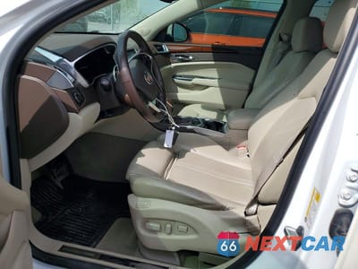 Zdjęcie 7 z 12 samochodu: 2014 CADILLAC SRX PERFORMANCE COLLECTION VIN:3GYFNCE35ES596359 - miniatura