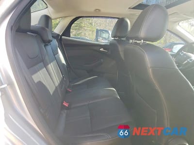 Zdjęcie 10 z 11 samochodu: 2014 FORD FOCUS TITANIUM VIN:1FADP3J23EL128579 - miniatura