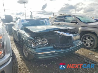 Czwarte zdjęcie samochodu z boku: 1996 LINCOLN TOWN CAR EXECUTIVE VIN:1LNLM81W0TY629956 - miniatura