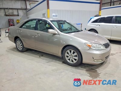 Czwarte zdjęcie samochodu z boku: 2003 TOYOTA CAMRY XLE V6 VIN:4T1BF30K93U052410 - miniatura