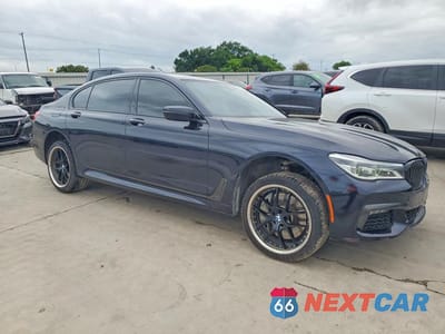 Czwarte zdjęcie samochodu z boku: 2018 BMW 750 I VIN:WBA7F0C5XJGM24179 - miniatura