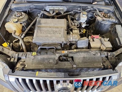 Zdjęcie 11 z 11 samochodu: 2010 MERCURY MARINER PREMIER VIN:4M2CN8HG6AKJ18083 - miniatura