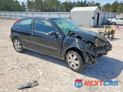 Czwarte zdjęcie samochodu z boku: 2001 FORD FOCUS ZX3 VIN:3FAFP31301R186761 - miniatura