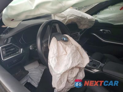 Zdjęcie 8 z 12 samochodu: 2021 BMW 330I VIN:3MW5R1J00M8B78029 - miniatura