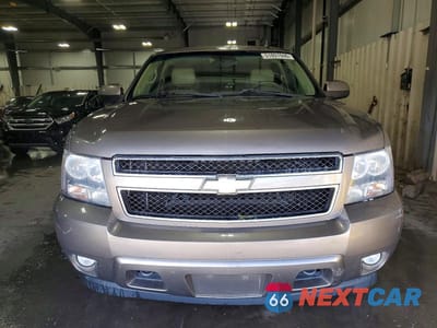 Piąte zdjęcie samochodu w środku: 2011 CHEVROLET SUBURBAN K1500 LT VIN:1GNSKJE33BR334511 - miniatura