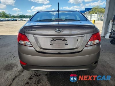 Zdjęcie 6 z 13 samochodu: 2013 HYUNDAI ACCENT GLS VIN:KMHCU4AE5DU311629 - miniatura