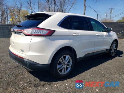 Trzecie zdjęcie samochodu z tyłu: 2017 FORD EDGE SEL VIN:2FMPK4J96HBB92821 - miniatura