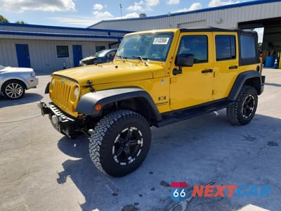 2009 JEEP WRANGLER UNLIMITED X 1J4GA39169L700197 - główne zdjęcie licytacji z USA - miniatura