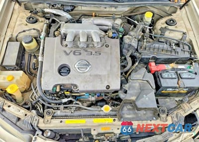Zdjęcie 11 z 12 samochodu: 2003 NISSAN MAXIMA GXE VIN:JN1DA31D13T525270 - miniatura