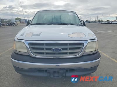 Piąte zdjęcie samochodu w środku: 2000 FORD F150 VIN:1FTRX17L1YKA73161 - miniatura