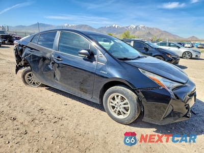 Czwarte zdjęcie samochodu z boku: 2016 TOYOTA PRIUS TWO VIN:JTDKBRFU3G3016557 - miniatura