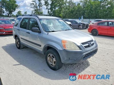 Czwarte zdjęcie samochodu z boku: 2004 HONDA CR-V LX VIN:SHSRD68414U209642 - miniatura