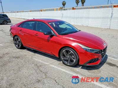 Czwarte zdjęcie samochodu z boku: 2021 HYUNDAI ELANTRA N LINE VIN:KMHLR4AF6MU152128 - miniatura