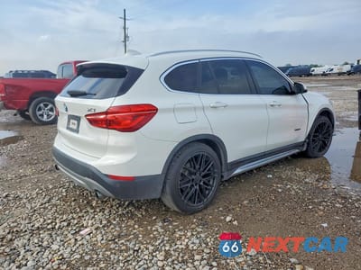 Trzecie zdjęcie samochodu z tyłu: 2017 BMW X1 XDRIVE28I VIN:WBXHT3C32H5F83385 - miniatura