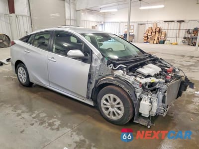 Czwarte zdjęcie samochodu z boku: 2021 TOYOTA PRIUS L ECO VIN:JTDKAMFU3M3143438 - miniatura