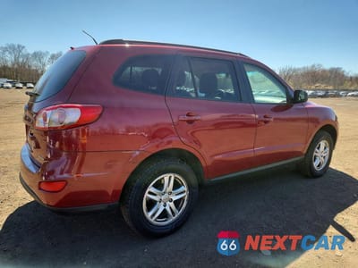 Trzecie zdjęcie samochodu z tyłu: 2012 HYUNDAI SANTA FE GLS VIN:5XYZGDAB1CG129969 - miniatura