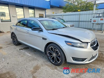 Czwarte zdjęcie samochodu z boku: 2014 FORD TAURUS SHO VIN:1FAHP2KT3EG121322 - miniatura
