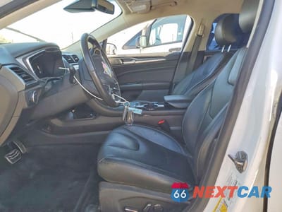 Zdjęcie 7 z 12 samochodu: 2016 FORD FUSION TITANIUM PHEV VIN:3FA6P0SU2GR241693 - miniatura