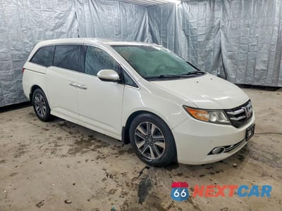 Czwarte zdjęcie samochodu z boku: 2016 HONDA ODYSSEY TOURING VIN:5FNRL5H94GB045551 - miniatura