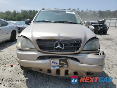 Piąte zdjęcie samochodu w środku: 2001 MERCEDES-BENZ ML 320 VIN:4JGAB54E31A279209 - miniatura