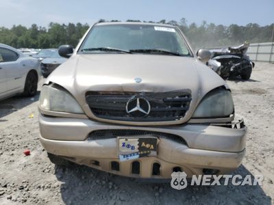Piąte zdjęcie samochodu w środku: 2001 MERCEDES-BENZ ML 320 VIN:4JGAB54E31A279209 - miniatura