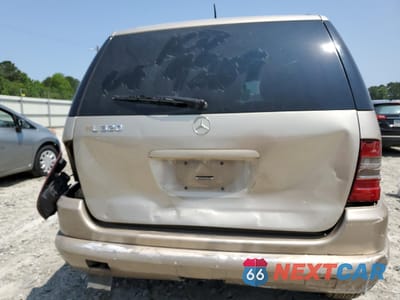 Zdjęcie 6 z 13 samochodu: 2001 MERCEDES-BENZ ML 320 VIN:4JGAB54E31A279209 - miniatura