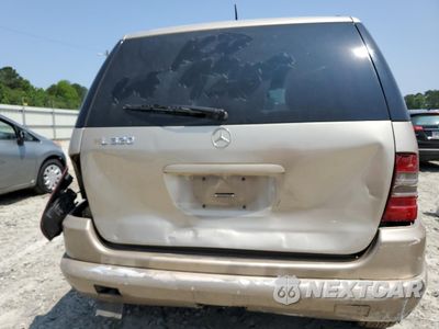 Zdjęcie 6 z 13 samochodu: 2001 MERCEDES-BENZ ML 320 VIN:4JGAB54E31A279209 - miniatura