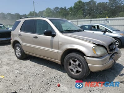 Czwarte zdjęcie samochodu z boku: 2001 MERCEDES-BENZ ML 320 VIN:4JGAB54E31A279209 - miniatura