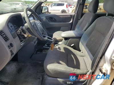 Zdjęcie 7 z 13 samochodu: 2002 FORD ESCAPE VIN:1FMYU03162KB99358 - miniatura