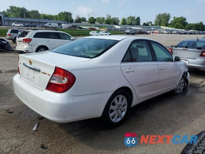 Trzecie zdjęcie samochodu z tyłu: 2002 TOYOTA CAMRY LE VIN:4T1BE32K32U052725 - miniatura