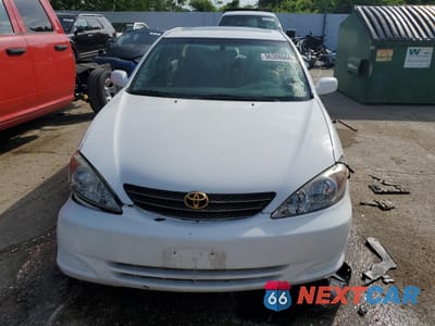 Piąte zdjęcie samochodu w środku: 2002 TOYOTA CAMRY LE VIN:4T1BE32K32U052725 - miniatura