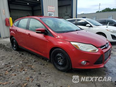 Czwarte zdjęcie samochodu z boku: 2012 FORD FOCUS SE VIN:1FAHP3K20CL149709 - miniatura
