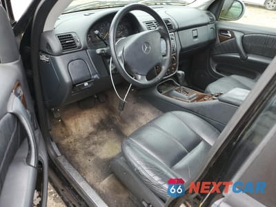 Zdjęcie 8 z 13 samochodu: 2001 MERCEDES-BENZ ML 320 VIN:4JGAB54E71A233494 - miniatura