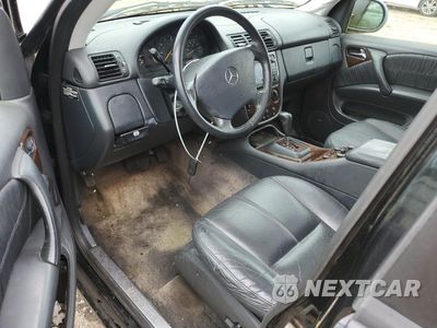 Zdjęcie 8 z 13 samochodu: 2001 MERCEDES-BENZ ML 320 VIN:4JGAB54E71A233494 - miniatura