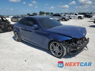 Czwarte zdjęcie samochodu z boku: 2010 BMW 135 I VIN:WBAUC7C51AVK96124 - miniatura
