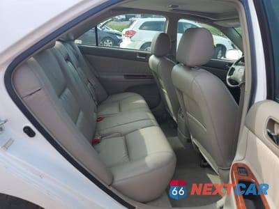 Zdjęcie 10 z 12 samochodu: 2002 TOYOTA CAMRY LE VIN:4T1BE32K32U052725 - miniatura