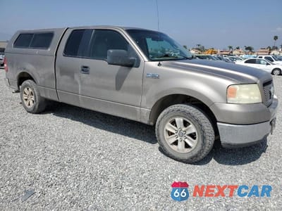 Czwarte zdjęcie samochodu z boku: 2006 FORD F150 VIN:1FTRX12W56FB77353 - miniatura