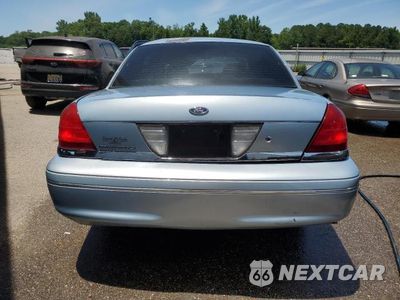 Zdjęcie 6 z 13 samochodu: 2005 FORD CROWN VICTORIA LX VIN:2FAHP74W55X130473 - miniatura