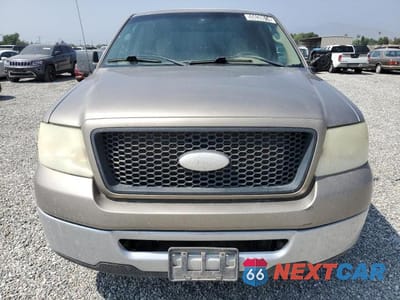 Piąte zdjęcie samochodu w środku: 2006 FORD F150 VIN:1FTRX12W56FB77353 - miniatura