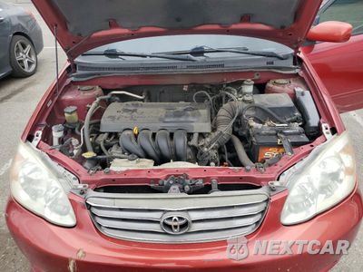 Zdjęcie 11 z 12 samochodu: 2003 TOYOTA COROLLA CE VIN:1NXBR32E63Z118863 - miniatura