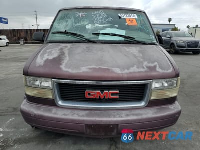 Piąte zdjęcie samochodu w środku: 1996 GMC SAFARI XT VIN:1GKDM19W2TB522130 - miniatura