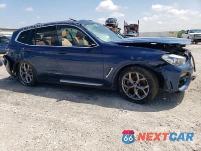 Czwarte zdjęcie samochodu z boku: 2021 BMW X3 XDRIVE30I VIN:5UXTY5C06M9G92038 - miniatura