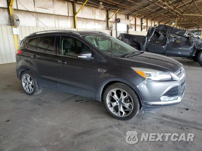 Czwarte zdjęcie samochodu z boku: 2015 FORD ESCAPE TITANIUM VIN:1FMCU0J93FUB95586 - miniatura