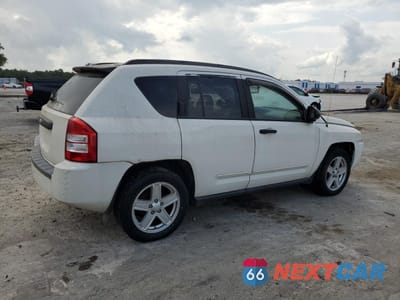 Trzecie zdjęcie samochodu z tyłu: 2009 JEEP COMPASS SPORT VIN:1J8FF47B99D137380 - miniatura